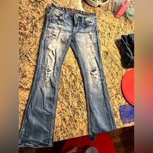 2 pairs of rock revival boot cut jeans, only have been worn 1 time.